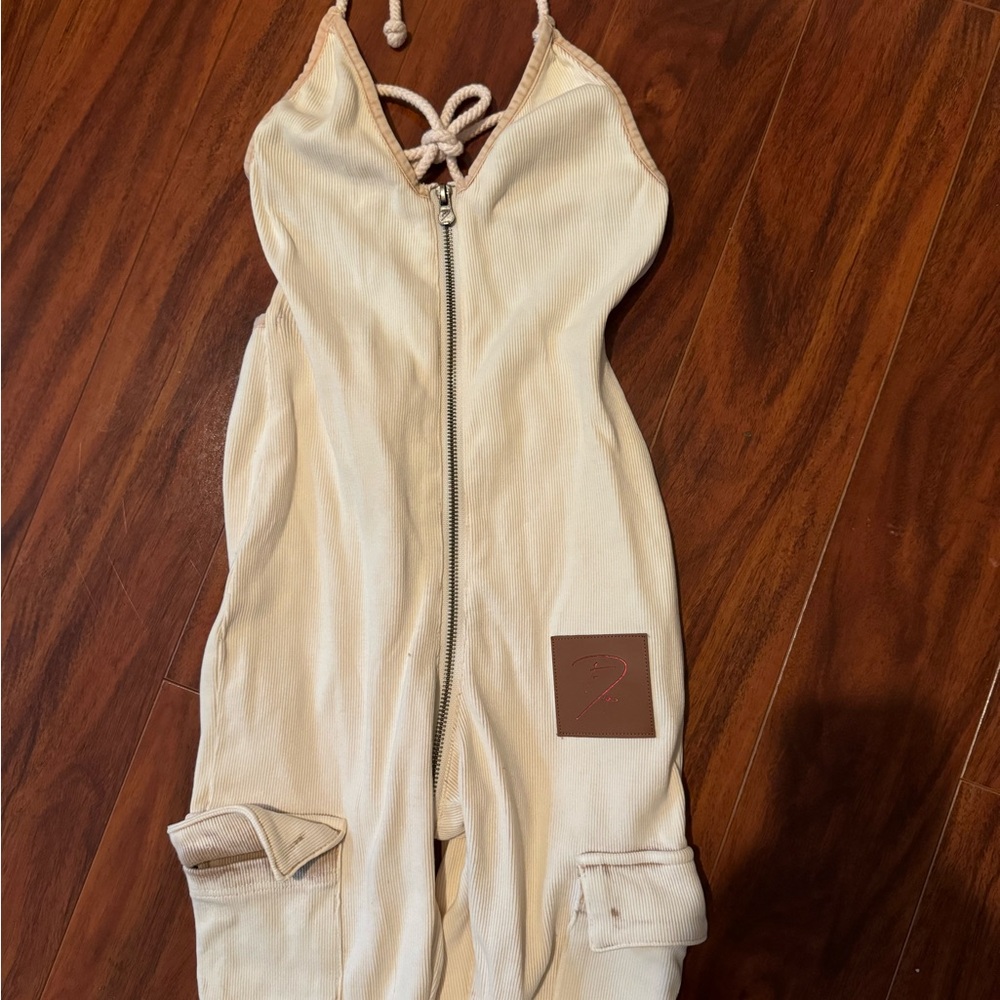 Cream Utility Jumpsuit with Zipper Front and Drawstring Details - Picture 2 of 3
